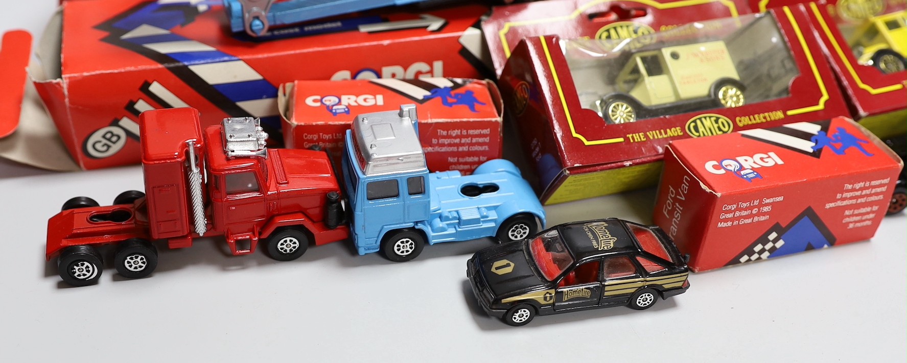 A quantity of corgi cars and trucks